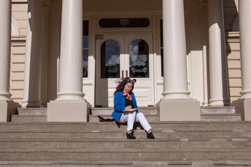 Pōhutukaryl Cosplay as Label Able, sketching on steps