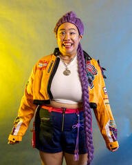 Pōhutukaryl Cosplay as Rumi from KPop Demon Hunters, smiling awkwardly