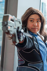 Pōhutukaryl Cosplay as Ashley Williams from Mass Effect 3, holding a gun off right